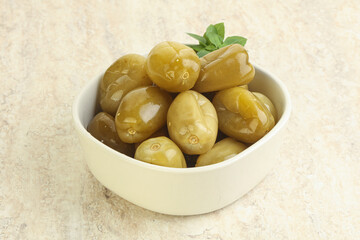 Pickled green tomato in the bowl