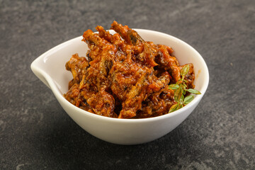 Canned anchovy in tomato sauce
