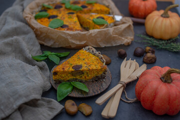 home made pumpkin quiche lorraine on a table