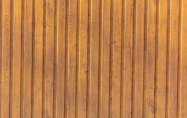 Wooden boards in the wall as a background.
