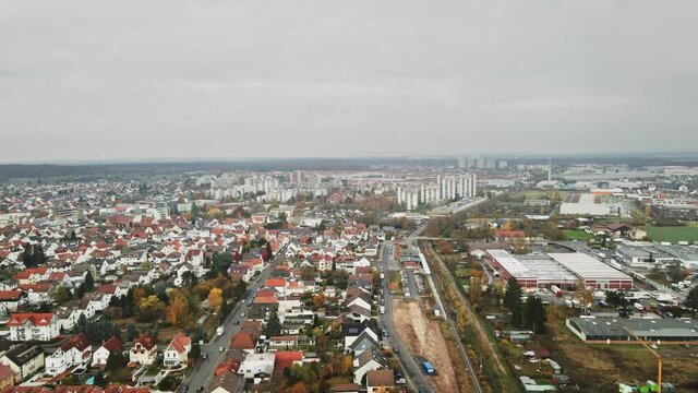 Aerial, panorama of small residential European town in Dietzenbach, Germany, Construction and High Rise Apartments
