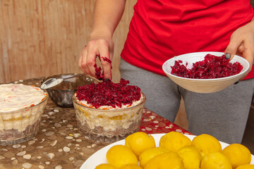 Woman Preparing beetroot vinaigrette.
