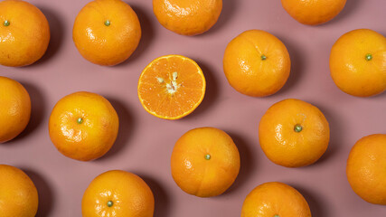 orange fruit on a pink background