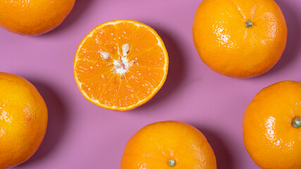 orange fruit on a pink background