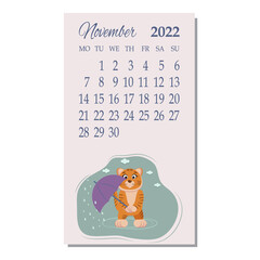 Calendar for November tiger C stands in the rain with an umbrella cold