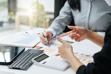 Businessman and partner hand holding pencil and making presentation business strategy.