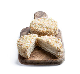 Portions of mille-feuille cake with sweet cream isolated on white