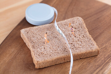 Playing badminton on miniature creative bread