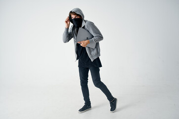 masked man hooded head hacking technology security Lifestyle