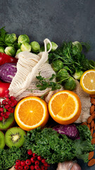 Fototapeta na wymiar Foods high in vitamin C on dark background.