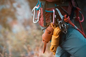 Girl with mountaineering equipment outdoor.