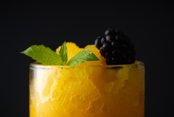 Frozen tequila based cocktail with mango. Selective focus. Shallow depth of field.
