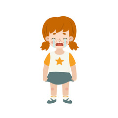 Crying little girl with red hair. Cute sad child. Unhappy weeping toddler.