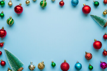 Christmas new year background pine tree ball bauble on blue pastel background