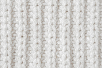 White knitted wool fabric texture background