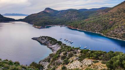 Obraz na płótnie Canvas Mediterranean sea and yacht. Bays and island.