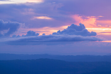 Fototapeta na wymiar Panorama of dramatic sunset and sunrise sky over mountain