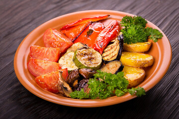 grilled vegetables on a clay plate
