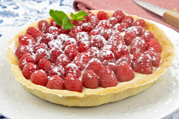 délicieuse tarte aux framboises entières