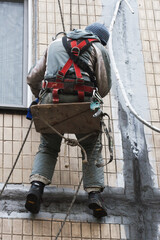 Industrial climber at work. Candid.