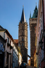 Obraz premium Kolin, Central Bohemia, Czech republic, 10 July 2021: Medieval stone St. Bartholomew´s Church with tower in sunny summer day, arched windows, chimeras and gargoyles, Gothic Cathedral with belfry