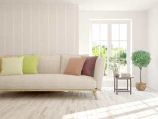 White living room with sofa and summer landscape in window. Scandinavian interior design. 3D illustration