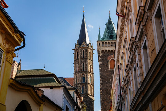 Kolin, Central Bohemia, Czech republic, 10 July 2021: Medieval stone St. Bartholomew&acute;s Church with tower in sunny summer day, arched windows, chimeras and gargoyles, Gothic Cathedral with belfry
