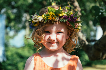 Portrait of girl in flower wreath
