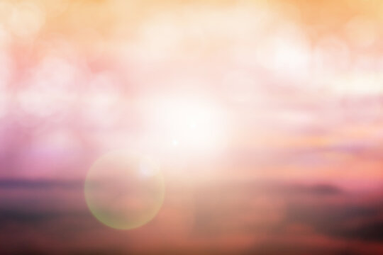 Abstract blur beach with white, yellow and blue sky sunrise background in summer holiday concept.