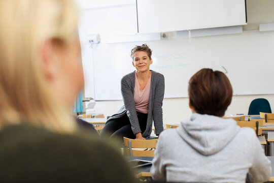 Teacher giving lecture in classroom