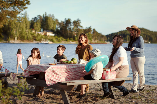 Family having picnic at lake