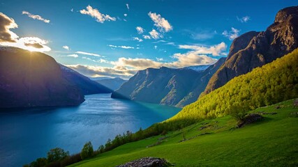 Time lapse shot of beautiful Norwegian Fjord during sunset time - Tranquil water floating,flying clouds during beautiful sunny day between green mountains - Flam,Norway - 5K Timelapse