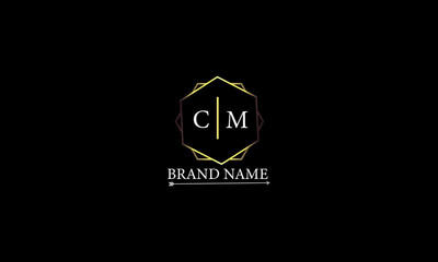 CM is a very luxury logo with a stylish design and golden color with black background.