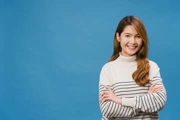 Portrait of young Asia lady with positive expression, arms crossed, smile broadly, dressed in...