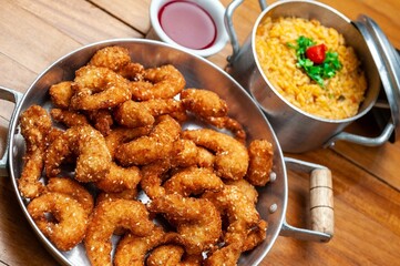 breaded sesame shrimp with sweet chinese sauce and rice