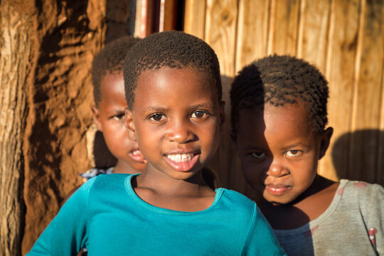 portrait of three African kids