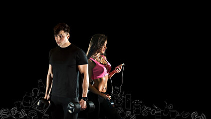 Fototapeta na wymiar Athletes on a background of drawn figures. Drawings symbolizing a healthy lifestyle on a black background. The concept of health, sports, positive mood and good habits. The couple trains together.