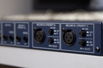 Fototapeta premium A hand holds a dvd disc in a close-up.