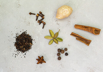 Ingredients for Indian masala tea on white background. High quality photo