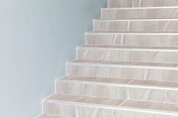 Building exterior stairs with antique white brown granite tiles