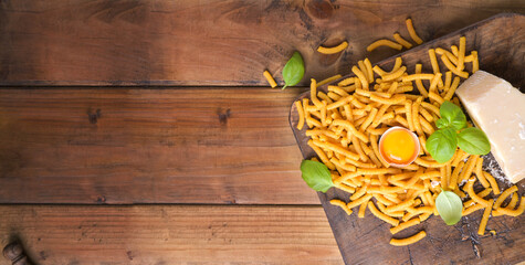  Fresh Parmesan Pasta Passatel. Traditional Italian food from the northern regions. banner. copy...