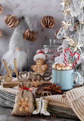 Fototapeta na wymiar Gingerbread with mug of hot chocolate and candy cane.