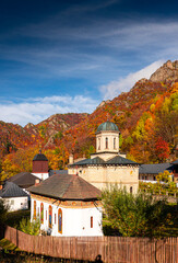 Stanisoara Monastery, built in the 18th century, is a orthodox religious landmark from Cozia Mountains and Romania. Photo taken in the autumn landscape.