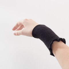 Cuff on the arm on a white background