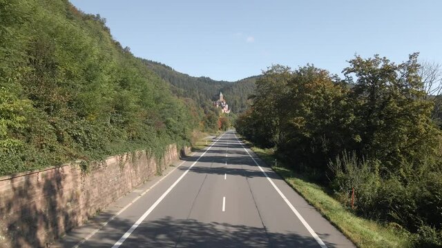 Drone shot flying fast over a road in the mountains of Germany