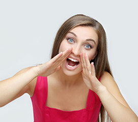 Fototapeta premium Portrait of beautiful girl screaming at the camera