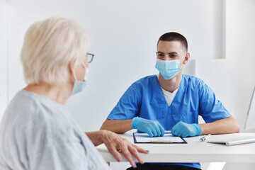 elderly patient at the doctor's and nurse's appointments health care