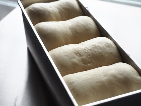 Raw Bread Dough In Baking Tin