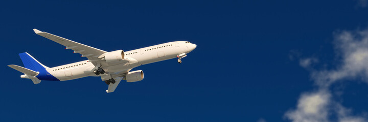 White airbus airplane on a blue sky background with white clouds 3d rendering