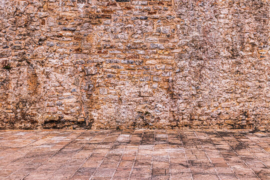 Old antique stone wall and pavement texture.